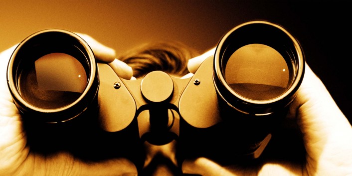 Businessman Using Binoculars